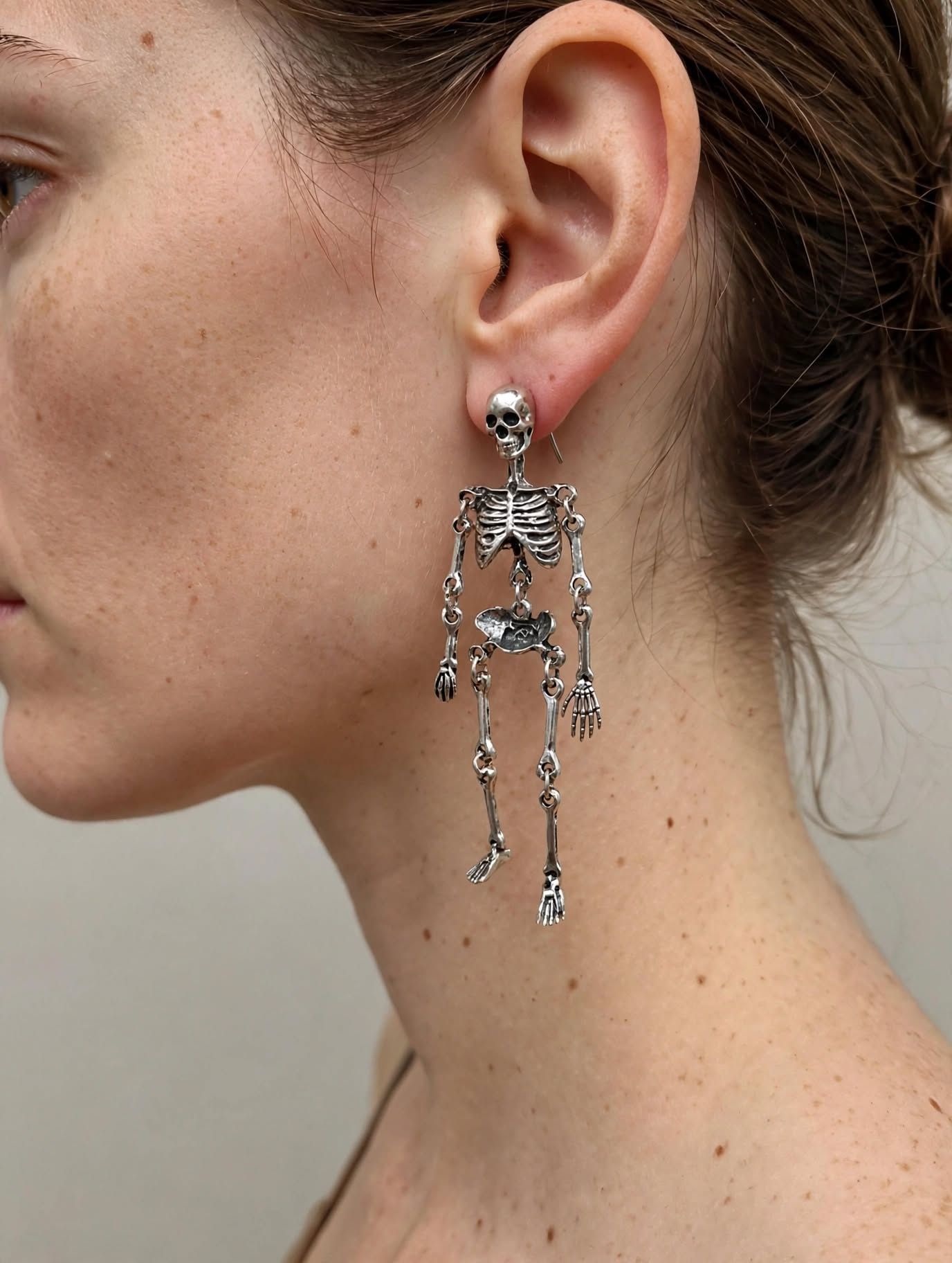 (E8) Dangly skeleton stainless steel boxed Earrings
