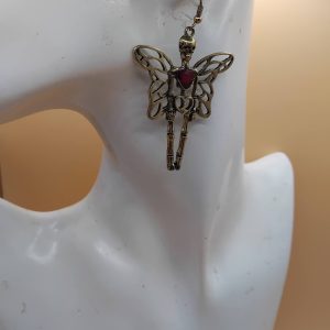 (E7) Winged skeleton with rhinestone heart boxed Earrings
