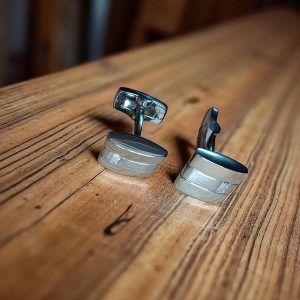 (Cf18) Pair of Jasper Conrad cufflinks with clear quartz crystal